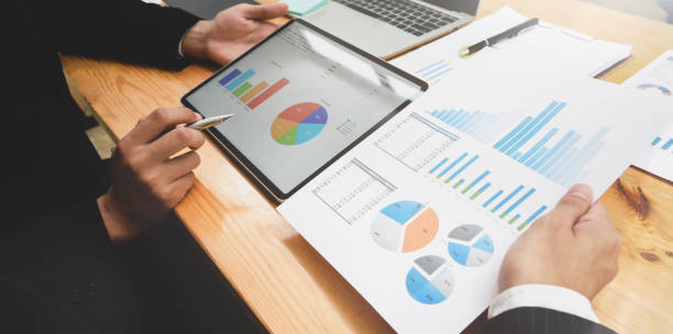istock A group of business people discussing together 1164059276