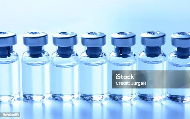 Medical Series Vials With Medication In A Row Stock Photo - Download Image Now - Vial, Medicine, Generic - Description