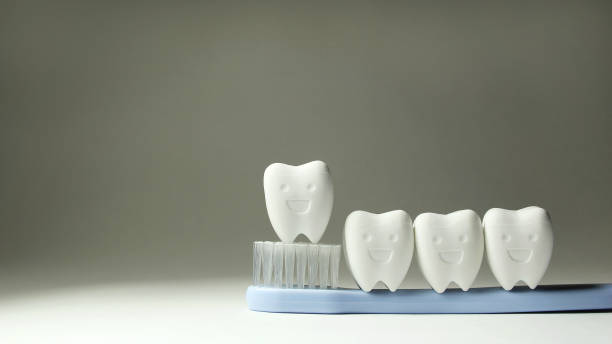 istock Group of Tooth model in happy emotion on Blue Toothbrush 1164071313