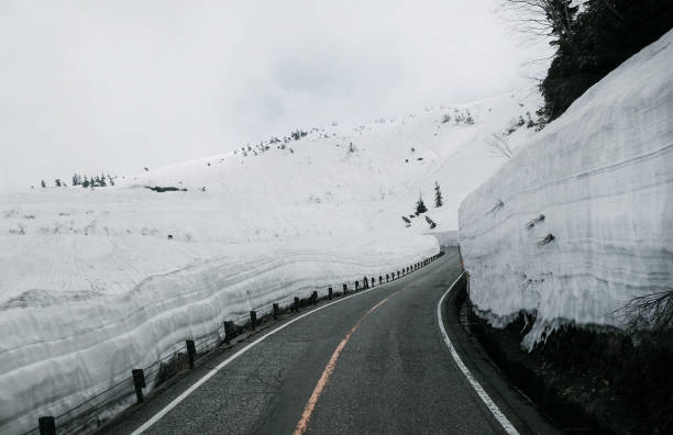 Road and Snow Wall  sideways at Tateyama, Japan