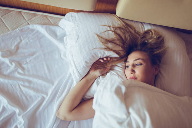 istock Woman in bed 1164075119