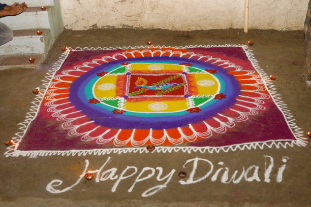 Indian festival Diwali, Diya oil lamps lit on colorful rangoli with Swastika symbol. Hindu traditional. Happy Deepavali.