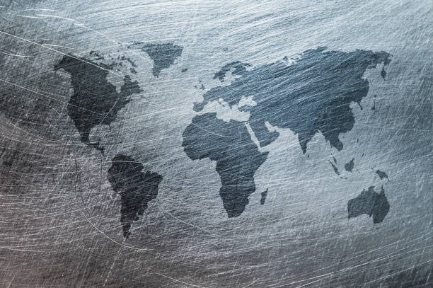 istock grunge map of the world over brushed metal texture 1164078814