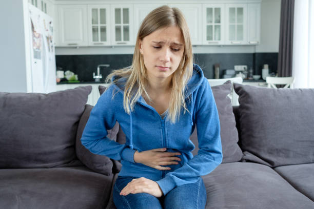 istock Sick girl belly 1164083016