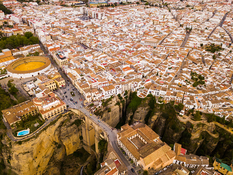 Aerial view of ancient city of Ronda located on two edges of gorge with Guadalevin river, Andalusia, Spain
