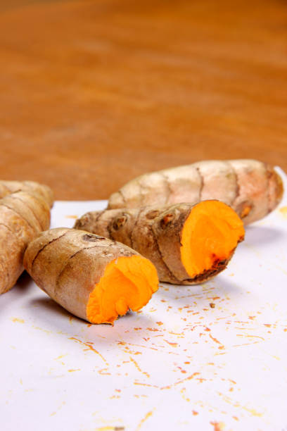 istock turmeric (curcuma) on wooden background 1164088208