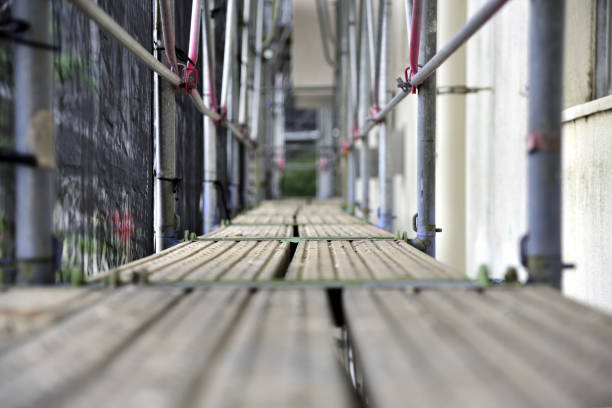 Scaffold of construction site. Apartment repair work.