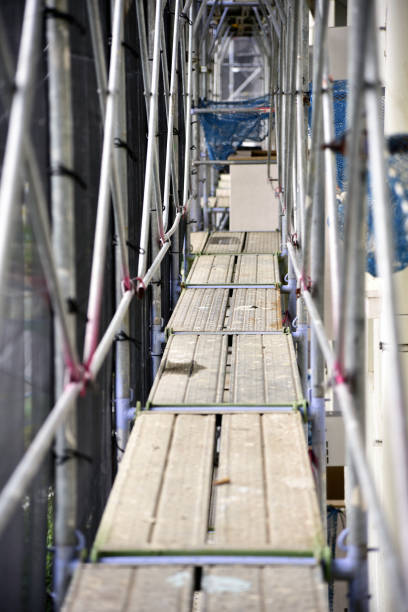 Scaffold of construction site. Apartment repair work.