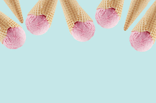 istock Strawberry ice cream in crisp waffle cones as decorative frame on green background, mock up, copy space. 1164092626
