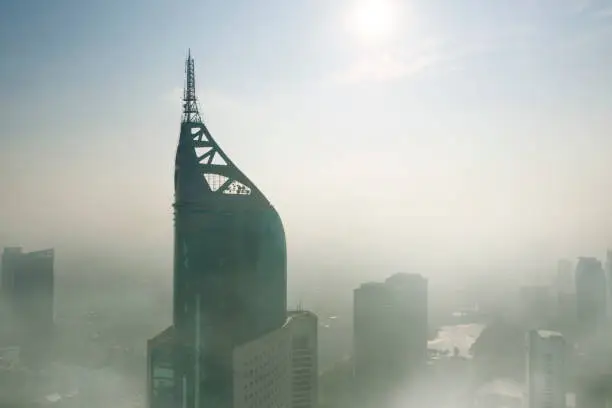 JAKARTA - Indonesia. April 24, 2019: Aerial view of air pollution in Jakarta city at morning time