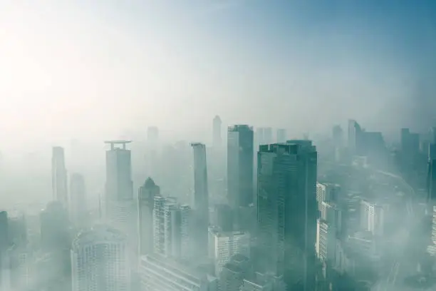 JAKARTA - Indonesia. April 24, 2019: Jakarta cityscape with air pollution at morning time