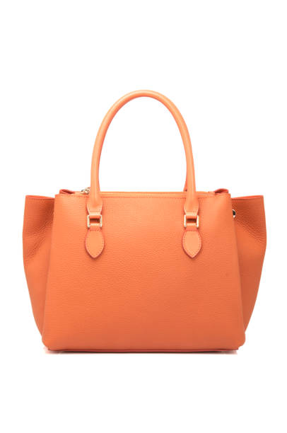 istock Orange Leather Women Bag On White Background 1164095332