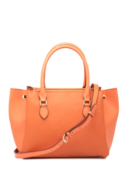 istock Orange Leather Women Bag On White Background 1164095333