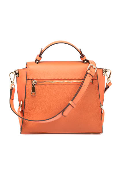 istock Orange Leather Women Bag On White Background 1164095339