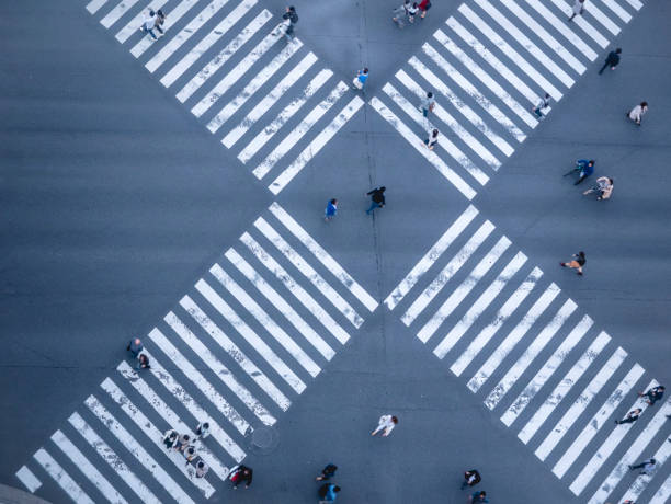 istock People walking Crosswalk street Signage Top view 1164095535