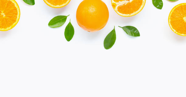 istock Fresh orange citrus fruit with leaves isolated on white background. 1164097290