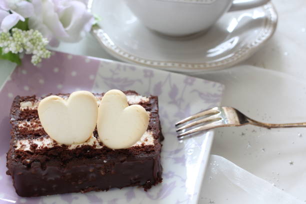 istock chocolate cake and heart shaped cookie on dish 1164097723