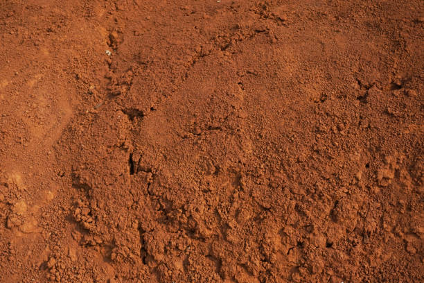 Abstract rough red soil texture stock photo