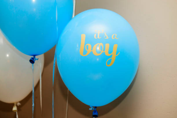 istock The blue sphere with an inscription is the boy 1164099253