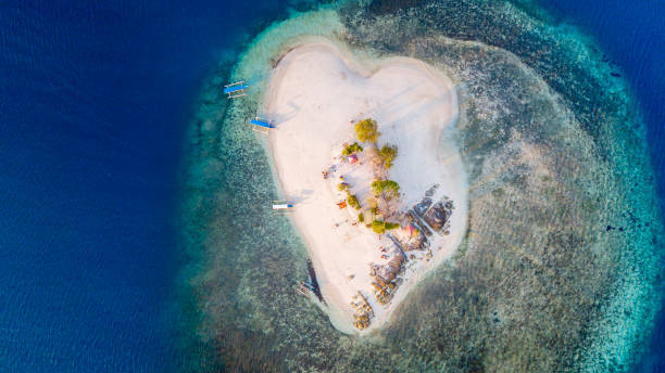 istock Beautiful white sand on Gili Kedis island 1164099273