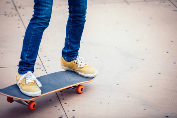 Man holding a skateboard