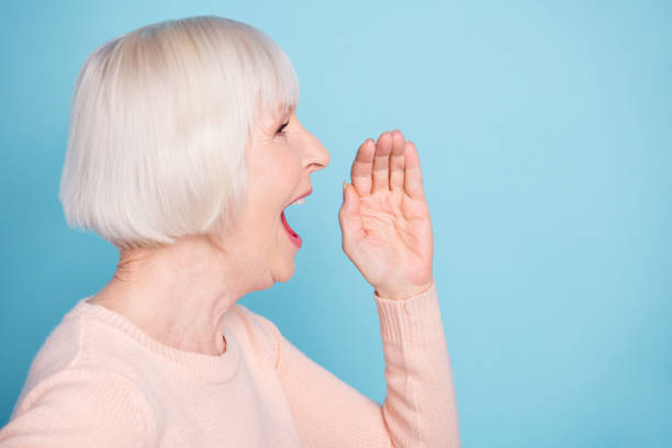 istock Profile side photo of charming woman screaming shouting novelty wearing pastel pullover isolated over blue background 1164101587