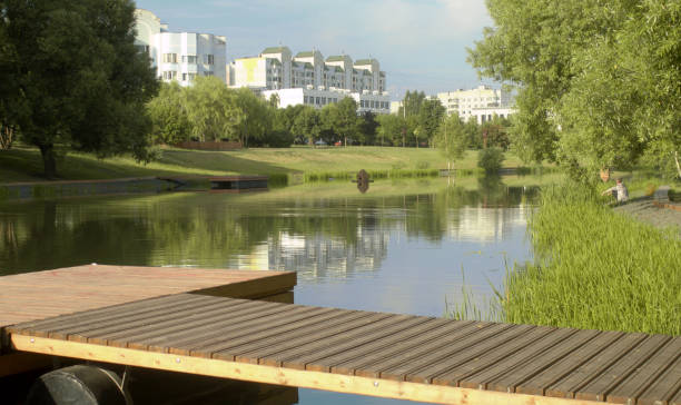 istock Quiet lake in public park in the morning 1164103377