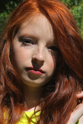 Image Of Young Redhead Girl Model 13 14 Years Old With Beautiful Long Hairstyle  And Red Ginger Hair Glowing Like Fire In Sunshine With Curls And Eaves  Posing Wearing Lipstick And Yellow