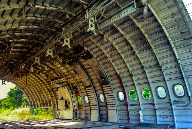 istock Ceiling structure of plane wreck close up shot 1164104425