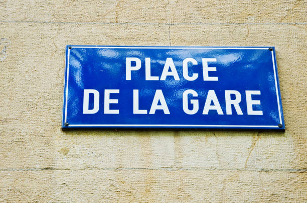 istock Street name sign: Place de la Gare, Neuchatel - Switzerland 1164105843