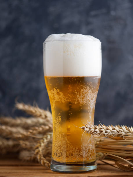 istock A glass of beer against a dark wall 1164105853