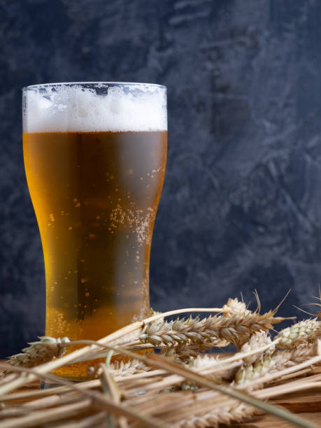 istock A glass of beer against a dark wall 1164105863