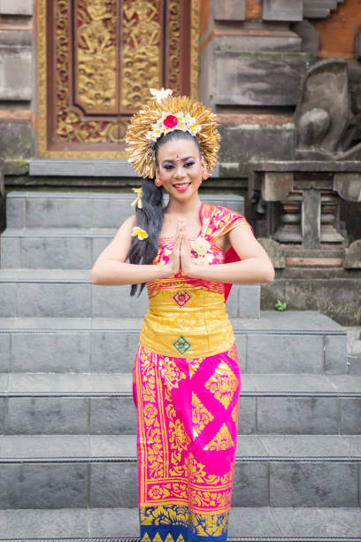 istock Friendly balinese dancer in traditional costume 1164108495