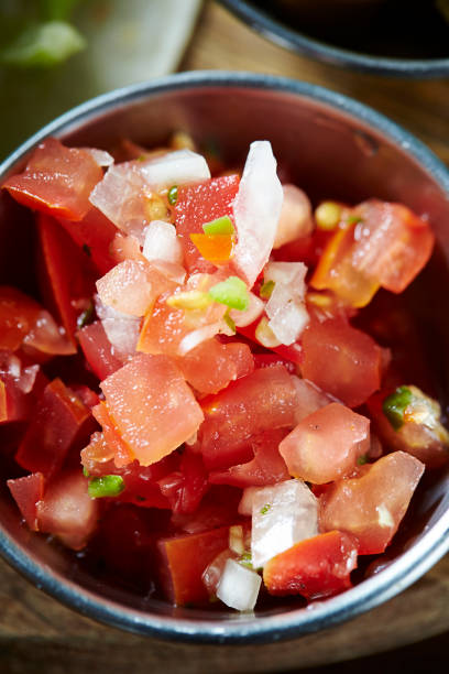 istock Diced tomato and onions 1164108658