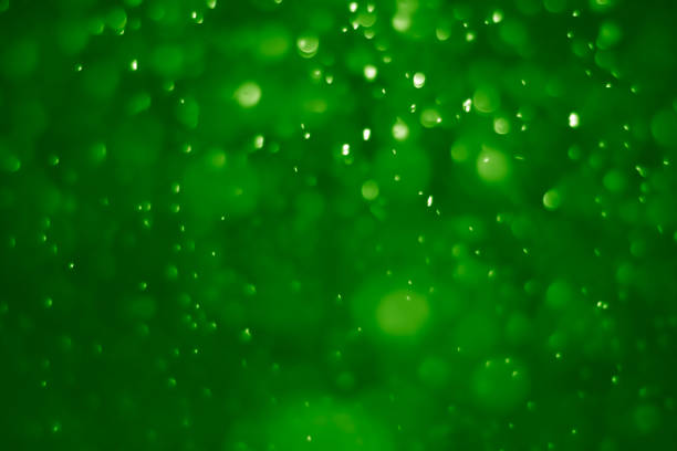 istock Green ufo bokeh background abstract - pictures 1164112719