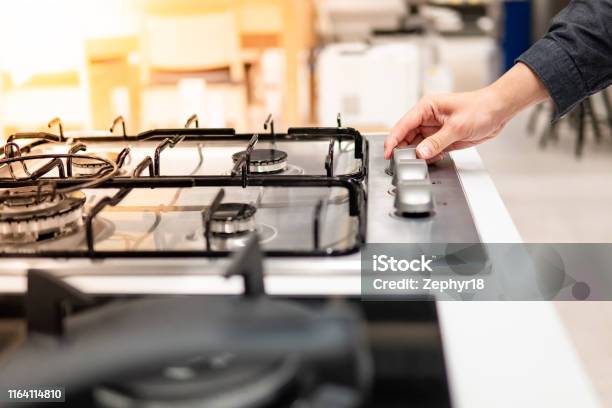 Male Hand Turning Switch Knob On Gas Stove Stock Photo - Download Image Now - Natural Gas, Gas, Gas Stove Burner