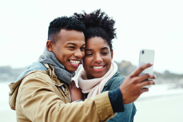 istock The beach is where selfies happen 1164123677