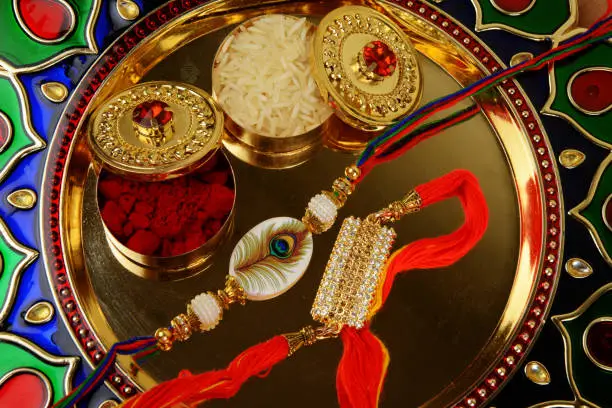 Raksah Bandhan or Rakhi, Indian festival for brothers and sisters,
on this festival sisters tie a bracelet on brothers wrist to ensure her security, and celebrate the festival by giving gifts and sweet to each other