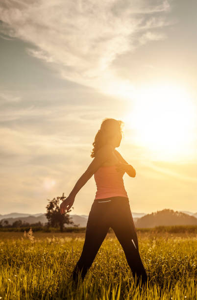 istock Athlete Stretching Outdoors, in Nature 1164128060