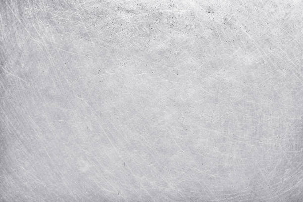 istock aluminium texture background, scratches on stainless steel. 1164138524