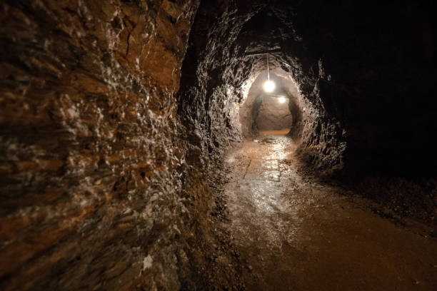 istock Interior Of Underground Illuminated Winding Mine Shaft 1164138866