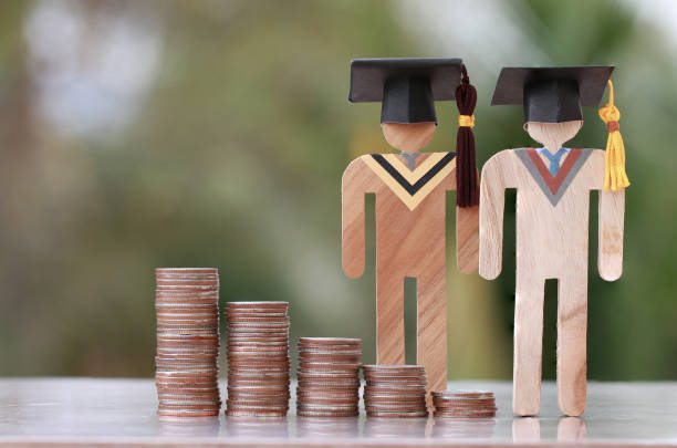istock Concept of Budget for education learning scholaship financial fee payment, models people in university knowledge achievement for study abroad international have to money expensive for fees student 1164140366