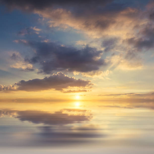 istock Background with sunset above sea 1164141814