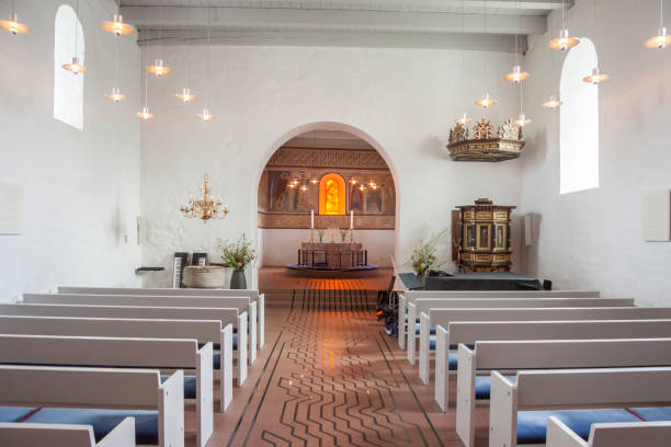 Interior of white church in Jelling, Denmark. stock photo