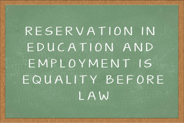 istock Reservation in education and employment is equality before law written in green chalkboard. 1164144392