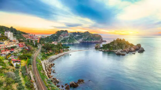 Panoramic aerial view of Isola Bella island and beach in Taormina. Giardini-Naxos bay, Ionian sea coast, Taormina, Sicily, Italy.