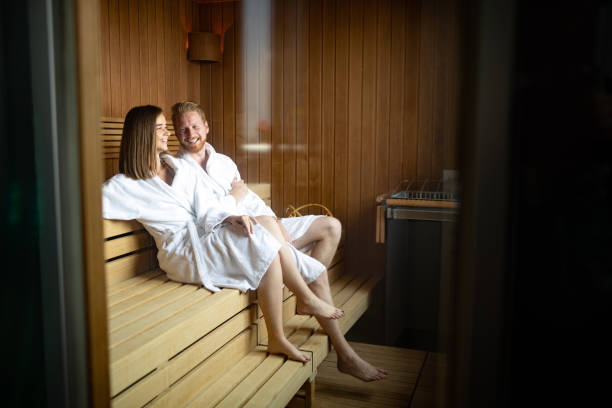 istock People in bathrobes using sauna at spa resort 1164149248