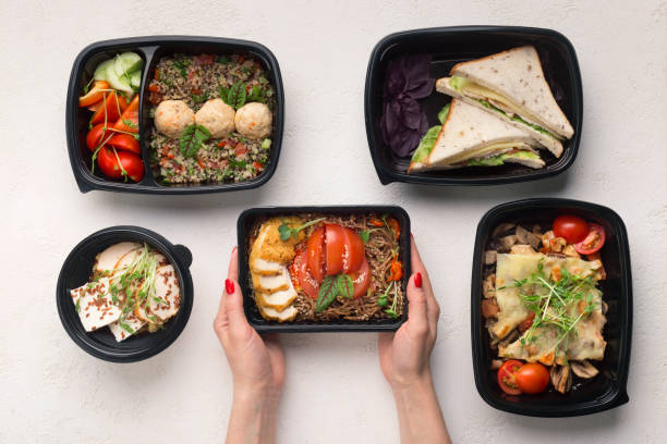istock Healthy food day ration in boxes, restaurant delivery 1164149411