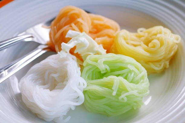 istock Colorful Thai rice noodles in dish ready to serve. 1164164371