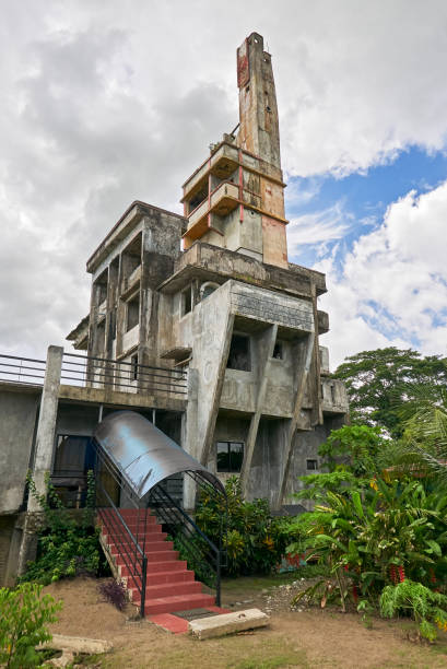 istock Strange bizarre unfinished concrete building in Asia 1164164484